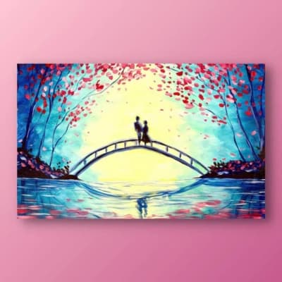 Couple standing close on a bridge