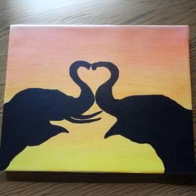 Elephants Forming A Heart With Their Trunks