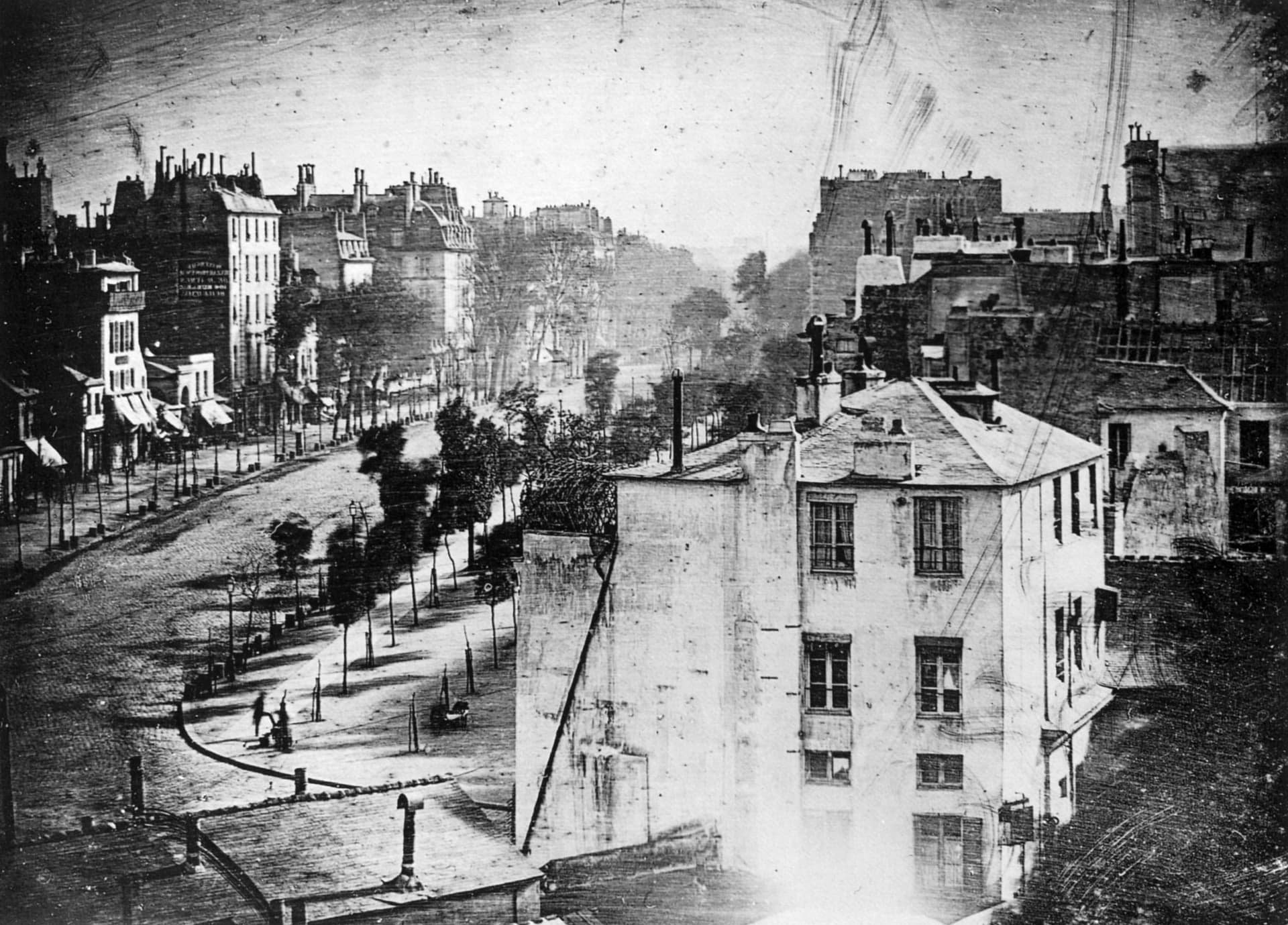 Early Daguerreotype Portrait or “Boulevard du Temple” by Daguerre